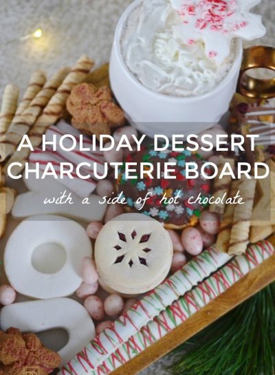 A HOLIDAY DESSERT CHARCUTERIE BOARD WITH A SIDE OF HOT CHOCOLATE