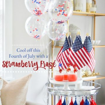 INSPO FOR YOUR FOURTH OF JULY PARTY: A STRAWBERRY FROSE SERVED ON A PATRIOTIC BAR CART