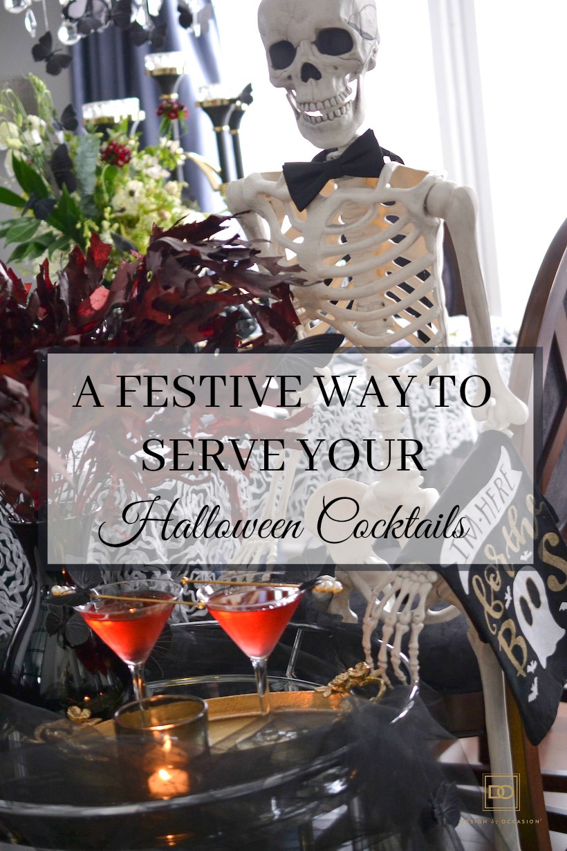 a festive way to serve your halloween cocktails - a halloween decorated bar cart