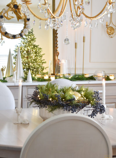A Festive Symphony: Green, Gold, and a hint of Blue Orchestrate Christmas Magic in the Dining Room